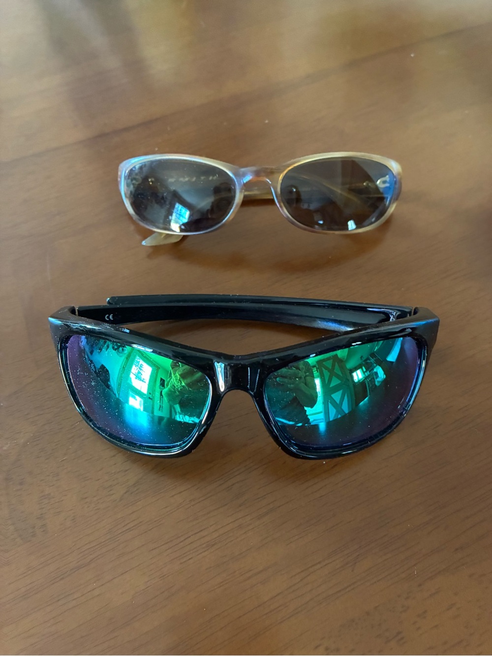 Two Pair Smith Sunglasses and Mirrored Green Lens Sunglasses for petite faces.